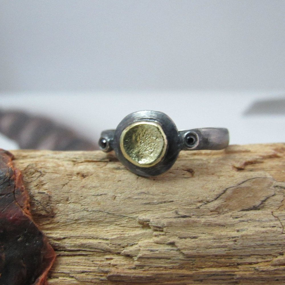 Sterling silver and 14K yellow gold ring. Ring with Black Spinel.